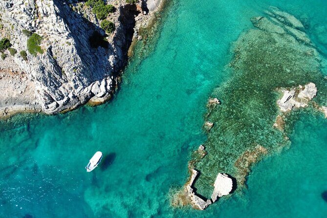 4 Hour Fishing and Swimming Boat Experience in Schisma Eloundas - A boat day that mixes fishing, swimming, and Spinalonga views