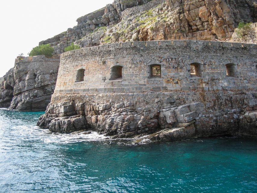 Agios Nikolaos: Boat Trip to Spinalonga with Swim Stop - Onboard sights: Olous, Pirate Barbarosa, and the Kri Kri goats