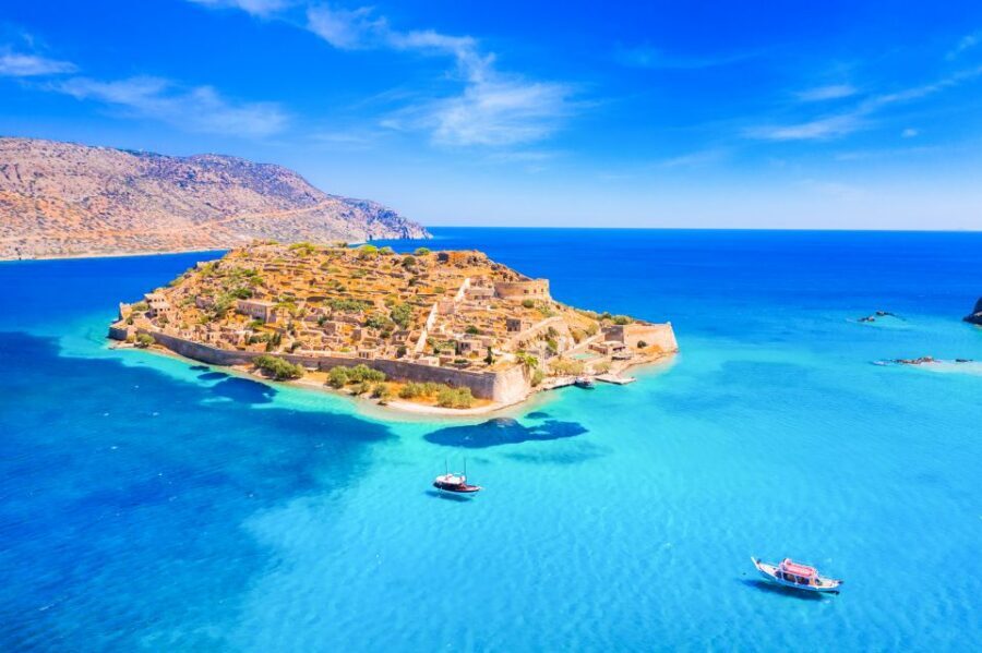Agios Nikolaos: Boat Trip to Spinalonga with Swim Stop - Kolokitha Bay swim stop: turquoise water, anchored calm, and a reality check