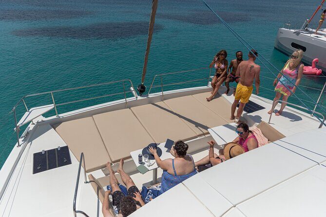 All-inclusice Catamaran Day Cruise from Hersonissos to Dia Island - The boat setup: shade, sunbeds, Wi‑Fi, and an onboard WC
