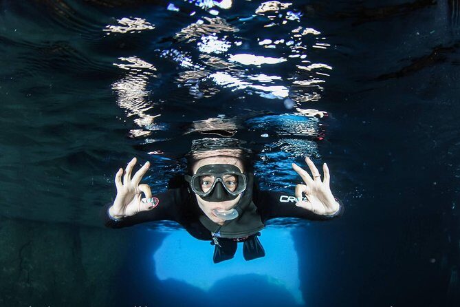 Boat Trip in Crete with Guided Snorkeling and Free Pick up! - Souda Bay drive: panoramic harbor views and stories you’ll remember