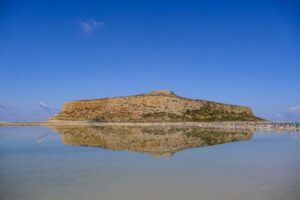 Chania/Almyrida: Balos Gramvousa Day Trip with Boat Ticket - The cruise views: Tersanas Cave and Vouxa Cape from the best seat on the sea