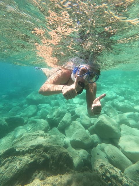 Chania: Boat Trip with Guided Snorkeling Tour - Stop two: another 45 minutes to find caves, fish, and rock life