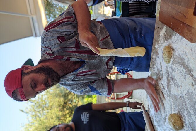 Chania Cooking Class-The Authentic Enjoy traditional Cretan meal - The long table: wine, soft drinks, and the full meal payoff