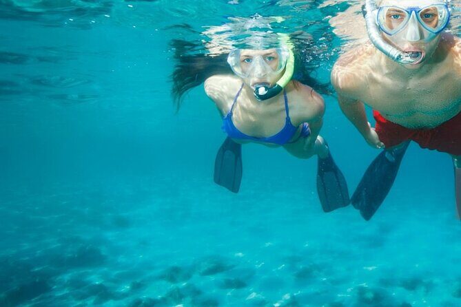 Chania Guided Snorkeling and Boat Excursion - First snorkeling spot: clear views, fish time, and a guide at your side