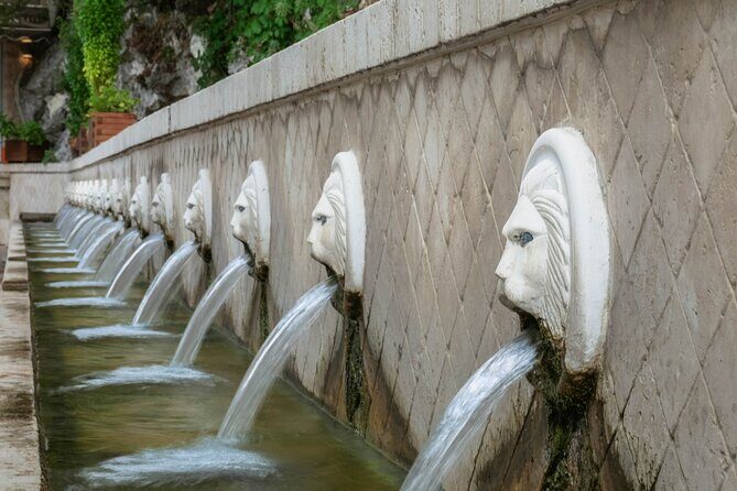 From Chania private trip to Spili-Kourtaliotiko-Kalypso beach - Stop 1: Spili Village and the Lion-Head Fountains Photo Moment