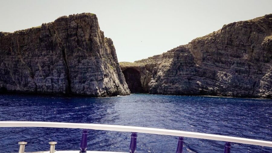 From Heraklion: Elounda, Kolokitha, and Spinalonga Boat Trip - Getting there: hotel pickup and the air-conditioned bus