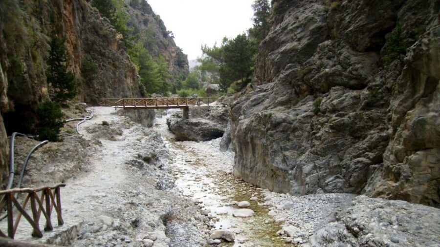 From Rethymno/Chania: Imbros Gorge Hike - Terrain reality check: rocky footing, heat, and water
