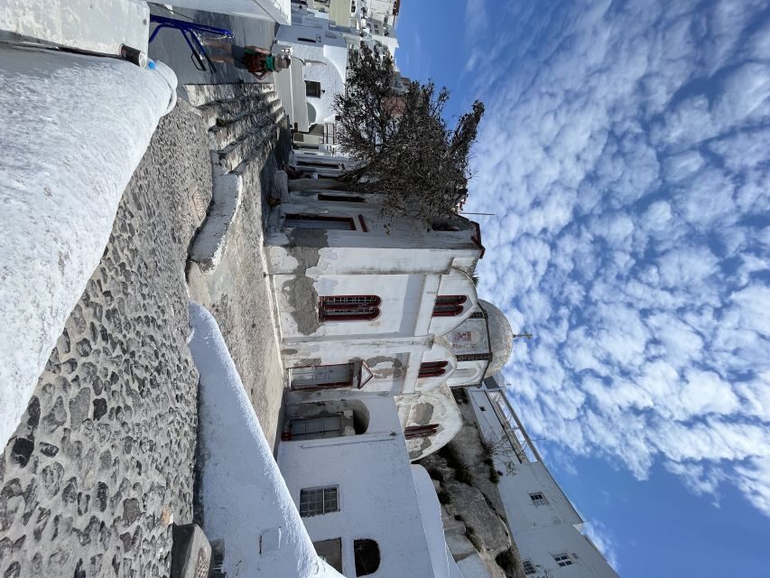 From Rethymno: Full-Day Trip to Santorini by Boat - Fira in the afternoon: alleys, shops, and choosing your own cliffside moment