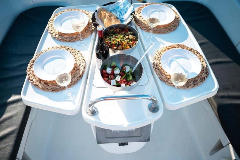Heraklion: Dia Island Sunset Boat Tour with Dinner - Dinner on Board: Greek Flavors with a Sea-View Seat