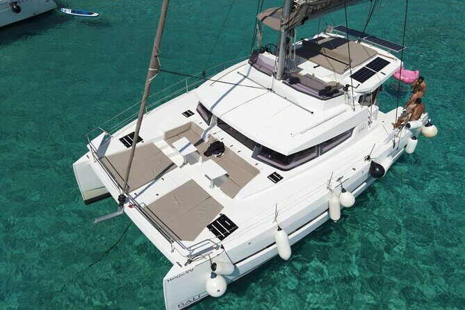 Panormo: Luxury Catamaran Cruise with Lunch & Open Bar - After lunch: relax on deck and do one more round of swimming