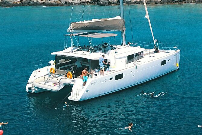 Rethymno Catamaran Cruise: Healthy Lunch & Open Bar - Water time is the real event: SUP, snorkeling, flamingo float, and fishing